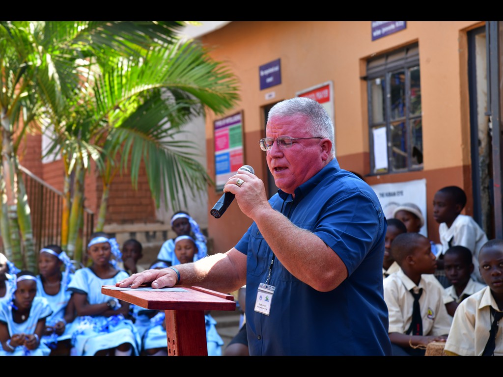 Brother Bart Grant leading in worship at one of the schools
