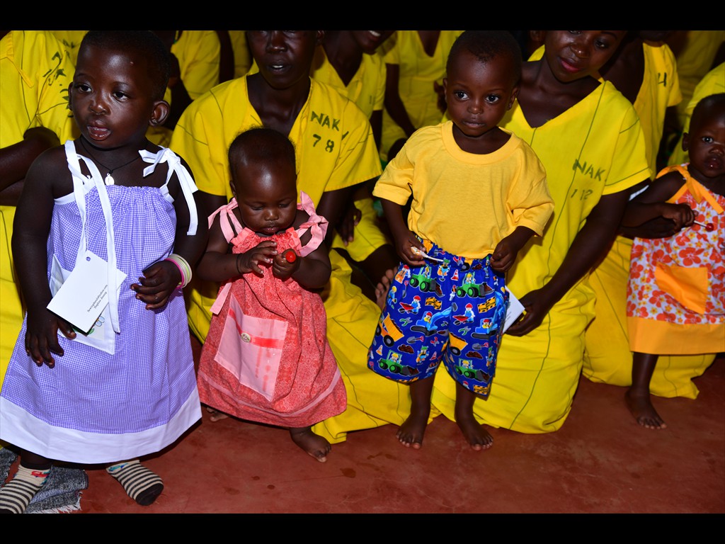 Children (who live in prison with their moms) in their new clothes from Mildred Catron