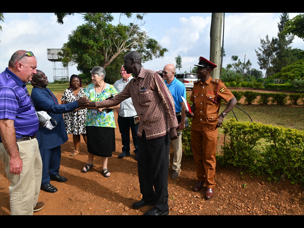 Pastor Joel's team greeting the officer in charge of a prison
